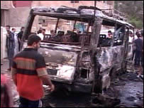 A bomb has ripped through a wedding convoy in Baghdad, killing at least 15 people, four of them children, the interior ministry says.