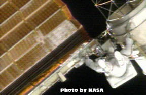 A change of plans has the space shuttle Discovery's astronauts prepping for a fourth spacewalk to get a half-retracted solar array to fold up.