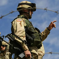 A U.S. soldier was sentenced to 100 years in prison Thursday night after pleading guilty in the rape and murder of a 14-year-old Iraqi girl and the slaying of her parents and sister, during a court-martial at Fort Campbell, Ky., a military spokeswoman said.