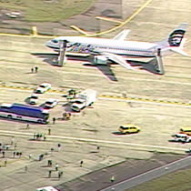 An Alaska Airlines jet has been isolated on the tarmac at Seattle-Tacoma Airport because of what officials are calling an unclaimed object on board.