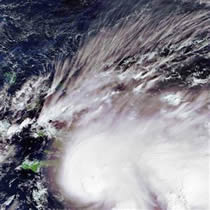 Flooding in the Dominican Republic caused by Tropical Storm Noel has killed at least 13 people.